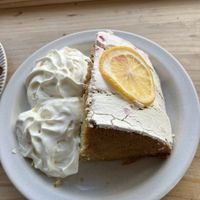 Lemon Raspberry cake with whipped cream, so pretty!  at Plantan Kaffihús in Reykjavik