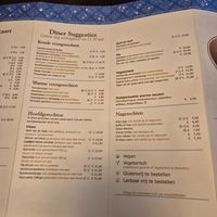 Menu kaart met logo's die niet kloppen at De Appel in Hengelo