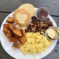 Breakfast plate with scrambled eggs, bacon, and a biscuit 😋   at Scratch Breakfast in Vancouver