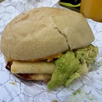 Egg ‘N Cheese Muffin with added bacon and avocado - delicious! 😋   at Scratch Breakfast in Vancouver