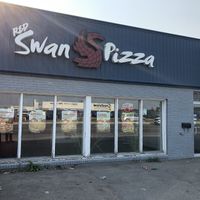A few parking spots out front   at Red Swan Pizza in Regina