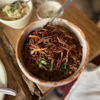 A rice and lentils dish with fried onions on top! Perfect to go with any entree.  at Adamá in Oaxaca
