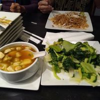 My lemongrass soup & steamed veggies, husband's Pad Thai. We ate all the spring rolls before taking picture - sorry! at VeStation Urban Organic Kitchen in Sherman Oaks