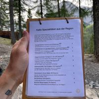 Menu with vegetarian & vegan options clearly listed at Chamanna Cluozza in Zernez