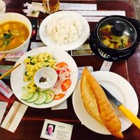 bahn mi with scrambled egg, curry soup, hot pot at Minh Hien in Hoi An