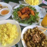 aubergine, garlic fried rice, fried spring rolls, tofu and passion fruit juice at Minh Hien in Hoi An