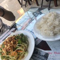 Papaya salad (left) which was a perfect dish. And side of rice 15000 vnd worth at Minh Hien in Hoi An