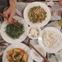 Morning glory, papaya salad, tofu in sweet and sour sauce at Minh Hien in Hoi An