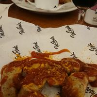Currywurst with fries and Pilot Mochaccino Stout. at The Fank in Isle Of Lewis