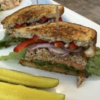 chicken salad sandwich w pickle spears  at Strong Hearts in Buffalo