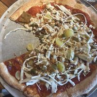 The Dirty Vegan pizza (with a slice missing because I couldn’t stop myself)  at Otomat in Mechelen