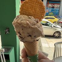 Holy Bueno and Smashed Bueno Sticks ice cream in a cone  at Plan(e)t Ice Cream in Athens