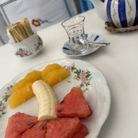 Fruit platter and Anis tea  at Arabian Tea House Restaurant & Cafe - Al Fahidi in Dubai