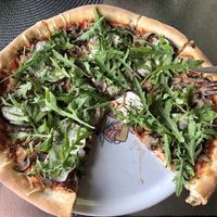 Rikolina, took a bite before taking a photo 🙈😂  at Pizzeria Piccolina in Osijek