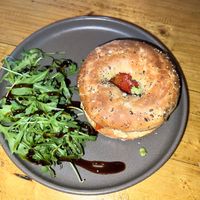 Bagel with hummus, roasted red peppers and avocado  at Seven Districts Coffee in Lincoln