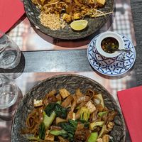 Vegan pad see ew and vegetarian pad Thai (with egg). at Les Amis Asia Dinner in Geneva