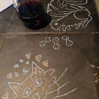Fun to draw on the table, glad for the vino too at Vegan A.F. in Brattleboro