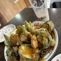 Rice bowl with tempura veggies and teriyaki sauce. And my almost finished coconut milk tea with pearls 🤣   at Alley Cat in Airlie Beach