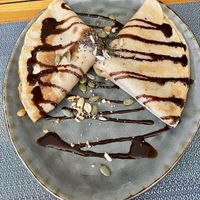 Vegan nuts and chocolate pancakes  at The Happy Cat - Veggie Cafe-Restaurant in Luang Prabang