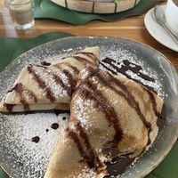 Banana , peanut butter and chocolate pancakes   at The Happy Cat - Veggie Cafe-Restaurant in Luang Prabang