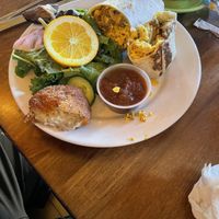 Breakfast burrito- with vegan sausage and hash brown on the side with tofu scramble Ranchero  at Pearl Moon in Woodstock