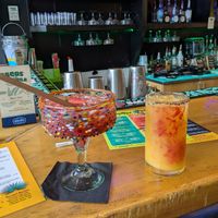 Strawberry and jalapeno marg and mango habanero marg with a raspberry drizzle at Lupe's 55 Cantina Mexican Grill in Hampton