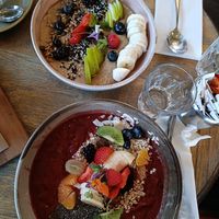 Acai bowl and porridge at Feather & Heart in Brentford