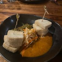 the tofu skewers! in the back is the veggie burger- also vegan without the cheese  at Bandaloop in Arundel