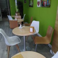 Small dining area. Also some seating outside. at Tres Semillas in Alicante