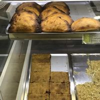 Empanadas (top) and spinach sundried tomato pie bottom at Tres Semillas in Alicante