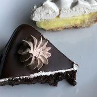 lemon meringue pie and choc cake at Tres Semillas in Alicante