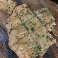 Vegan cheese and garlic squares   at Coolangatta Pizzeria in Coolangatta