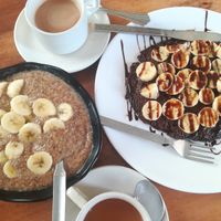 Millet porridge, nutella pancake, masala tea with coconut milk at Millets of Mewar in Udaipur