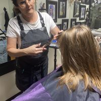 Owner Laurie Howard with client   at Wicked Salon in North Little Rock