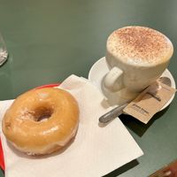 Donut and cappuccino   at Santa Vegana in Barcelona