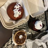 Red velvet donut with Nutella filling and cupcake  at Santa Vegana in Barcelona