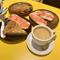 Potato tortilla, empanada, and an extra portion of pan con tomate!  at Santa Vegana in Barcelona