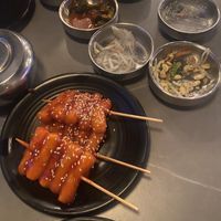 Crispy rice cakes and assorted pickled veg. ***THE KIMCHI IS NOT VEGAN***  at Sura Korean BBQ & Tofu House in Long Beach
