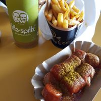 Vegan currywurst with spicy curry sauce and fries (and beloved Apfelschorle) at Curry Co in Dresden