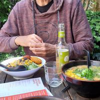 Guy with Mix Salat und Vegan Miso Ramen at 957 Ramen Bar in Marburg