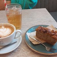 Oat milk cappuccino, apple juice and banana bread at Gaard 2 Coffee Hide in Sheffield
