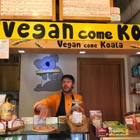 Helpful owner and shop packed with vegan goodies at Vegan Come Koala in Pisa