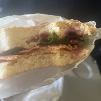 Focaccia with deli slices made from seitan mayonnaise, vegan cheese, lettuce red cabage.   at Vegan Come Koala in Pisa