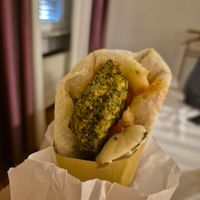 Tofu spinach burger in focaccia wrap at Vegan Come Koala in Pisa