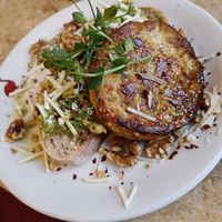 Vegan Spanish omelette with sourdough, avocado and vegan cheese.  In the menu, this is the "poached egg and avocado" but made vegan. at Linen Hall Cafe in Belfast
