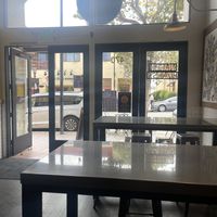 Inside looking out on popular Alvarado st    at Nacho Bizness in Monterey