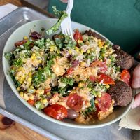 Falafel, greens, tomatoes hummus, corn salad, balsamic vinaigrette, and more!    at Mezeh in Chesapeake City