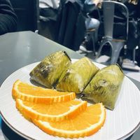 Sticky rice with banana and black bean, wrapped in banana leaf. Amazing!   at Siwa Lee in East Gosford