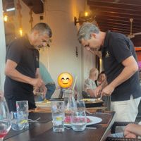 Serving the paella at Alcanada 35 in Mallorca