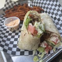 “Buffalo” Chicken Wrap (with vegan chicken and sweet potato fries, does not contain buffalo sauce)  at The Kilt and Clover in St Catharines